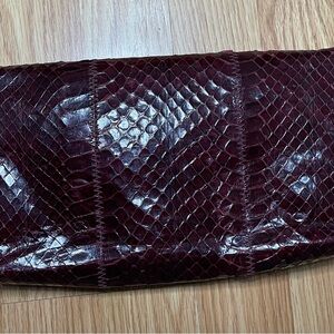 Elegant Burgundy Snakeskin Clutch